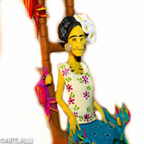 Catrina Frida on chair