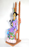 Catrina Frida on chair